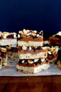 Fully Loaded Bars | Oat shortbread crust, peanut butter caramel, roasted peanuts, pretzels, and semi-sweet chocolate chips! [from bakerita.com]