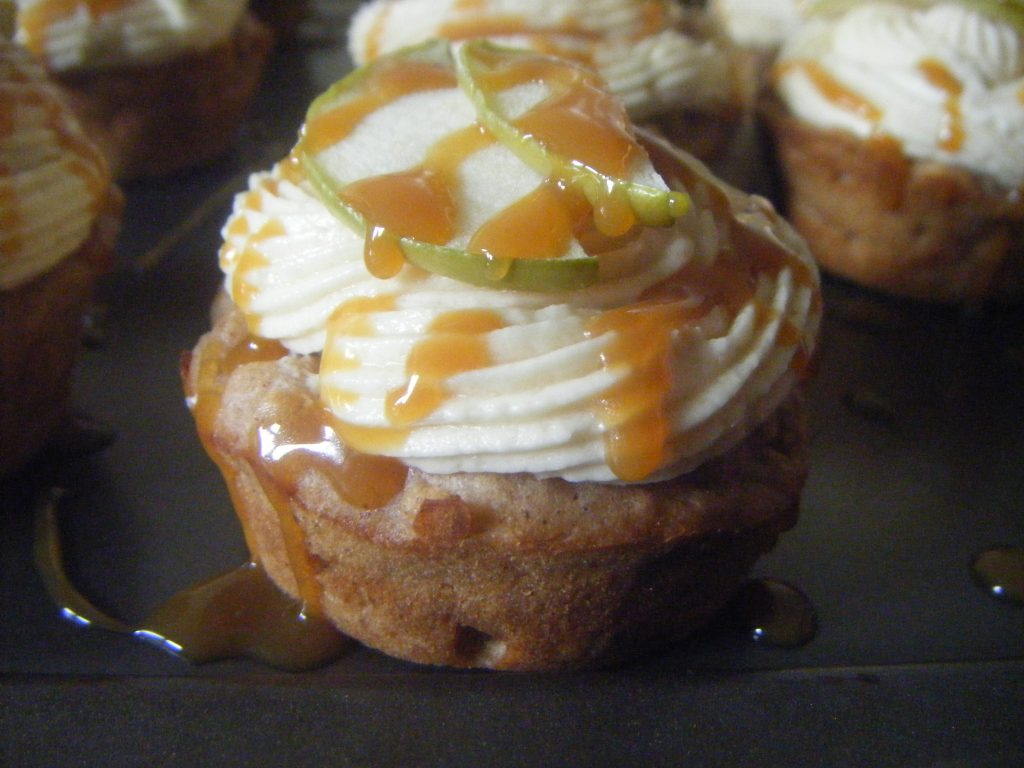 Super moist and delicious caramel apple cupcakes with sweet caramel frosting! These are a wonderful fall treat.