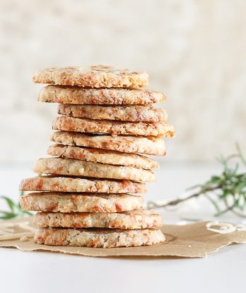 These Parmesan Rosemary Savory Shortbread Rounds are tender slice and bake crackers bursting with Parmesan cheese and fresh rosemary flavor.