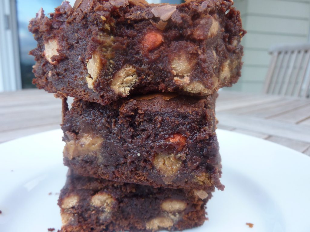 Candy Baked Brownies are rich, fudgy chocolate brownies filled with your favorite chocolate candies! This will be your new favorite brownie recipe.