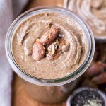 This Maple Almond Butter is made with maple roasted almonds and a hint of vanilla, and made even more nutritious with sunflower seeds, chia seeds, flax seeds, and hemp seeds! You're going to want to spread this almond butter on everything.