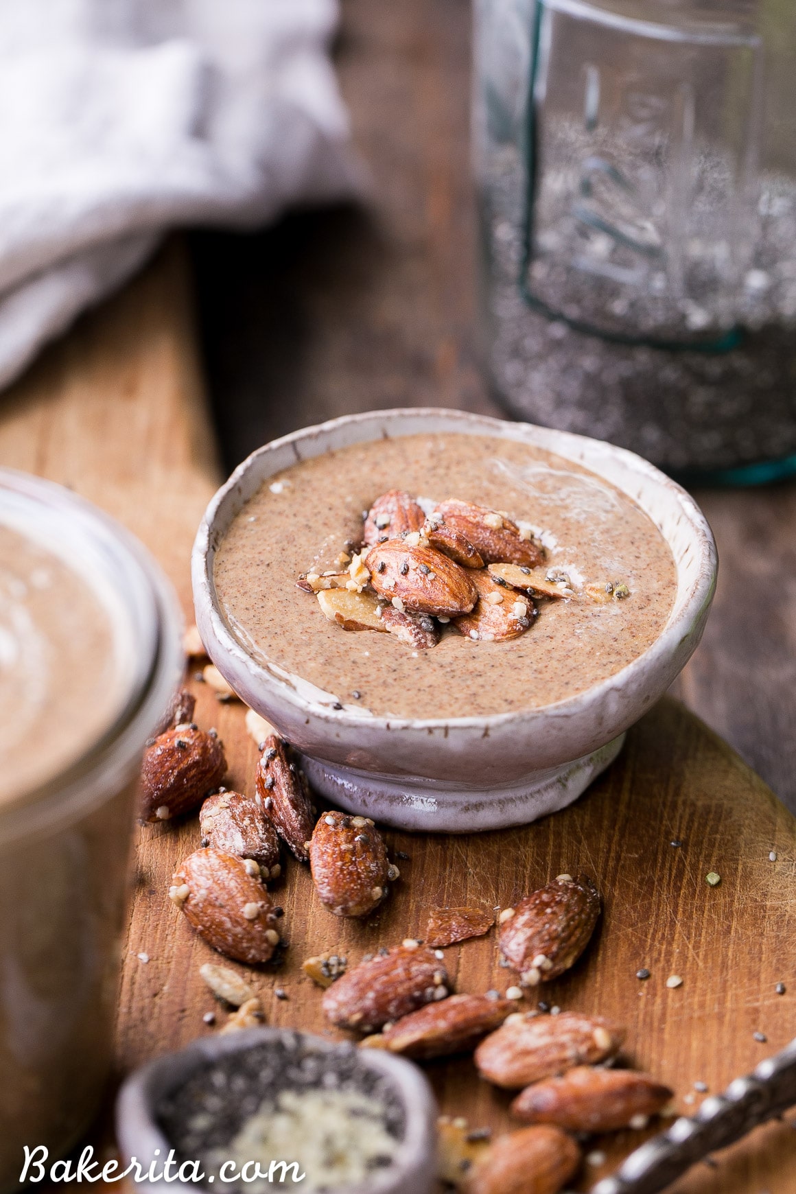 This Maple Almond Butter is made with maple roasted almonds and a hint of vanilla, and made even more nutritious with sunflower seeds, chia seeds, flax seeds, and hemp seeds! You're going to want to spread this almond butter on everything.