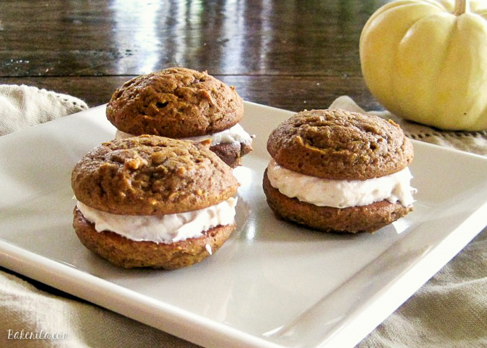 Pumpkin Spice Whoopie Pies with Cinnamon Cream Cheese Frosting | Recipe from Bakerita.com