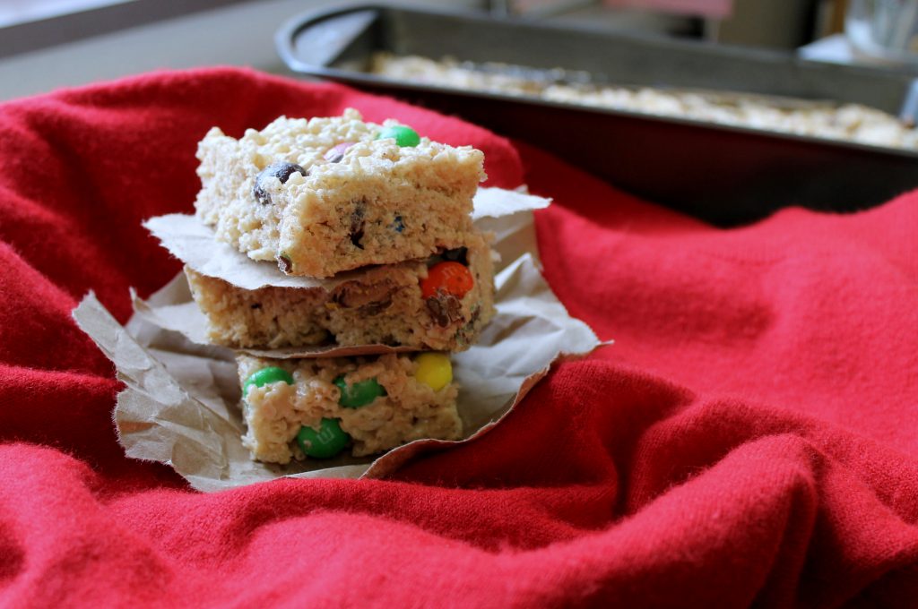 These Peanut Butter M&M Rice Krispie Treats are a easy, delicious twist on the classic Rice Krispie Treat. You'll love the flavors in here, and the recipe comes together quickly and easily in the microwave.
