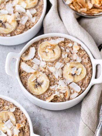 This Banana Coconut Baked Oatmeal is packed with fiber and potassium for a healthy, hearty breakfast. This easy recipe is vegan, gluten-free, and sweetened with a ripe banana - no added sugar needed!