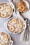 This Banana Coconut Baked Oatmeal is packed with fiber and potassium for a healthy, hearty breakfast. This easy recipe is vegan, gluten-free, and sweetened with a ripe banana - no added sugar needed!