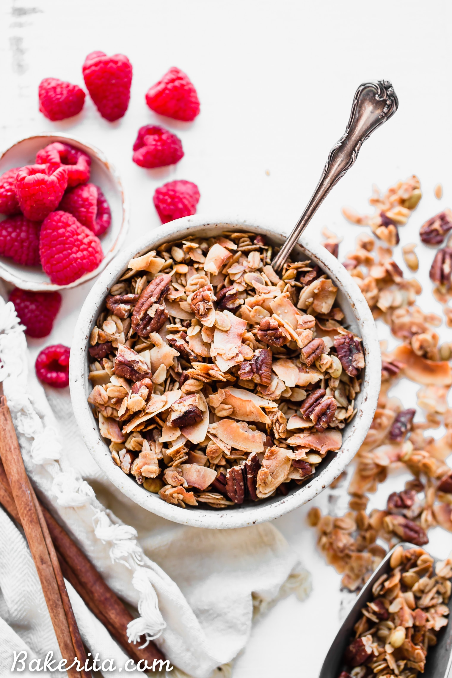 This Coconut Pecan Granola is a flavorful, crunchy, and just lightly sweetened with maple syrup. This gluten-free, refined sugar-free, and vegan granola is perfect for stirring into your yogurt, serving with milk or eating on its own as a snack.