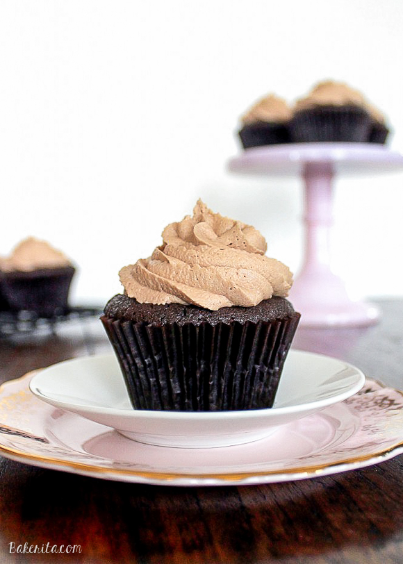 These Chocolate Cupcakes with Nutella Buttercream have a Ferrero Rocher truffle stuffed inside! Everyone will love these surprise inside cupcakes.