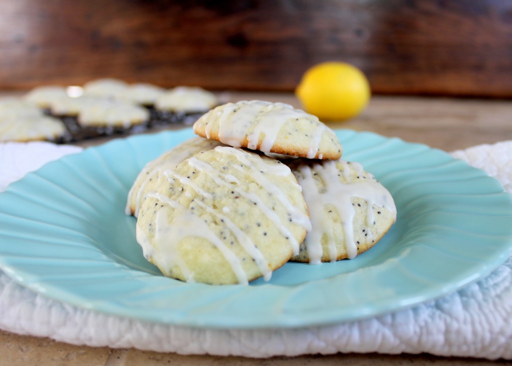 These sweet + cakey Lemon Poppy Seed Cookies get a lemony hit from both zest and juice! They're studded with poppy seeds and completed with a delicious lemon glaze.