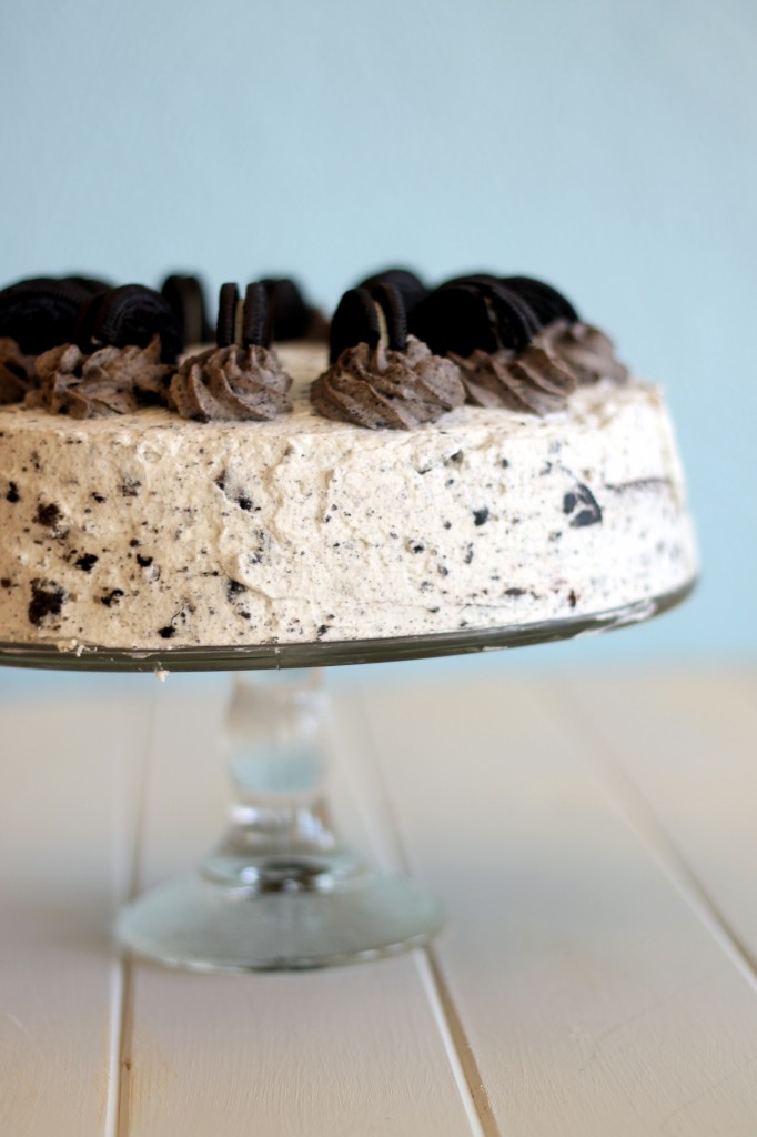 This Oreo Cake has two layers a rich, moist chocolate cake filled and covered in a light Oreo whipped cream frosting! It makes a great birthday cake.