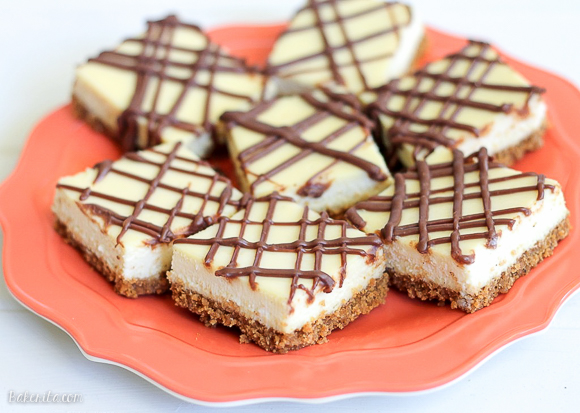 This easy recipe for Cheesecake Bars makes a simple dessert bar that is super creamy, so delicious, and is way easier than making a whole cheesecake!