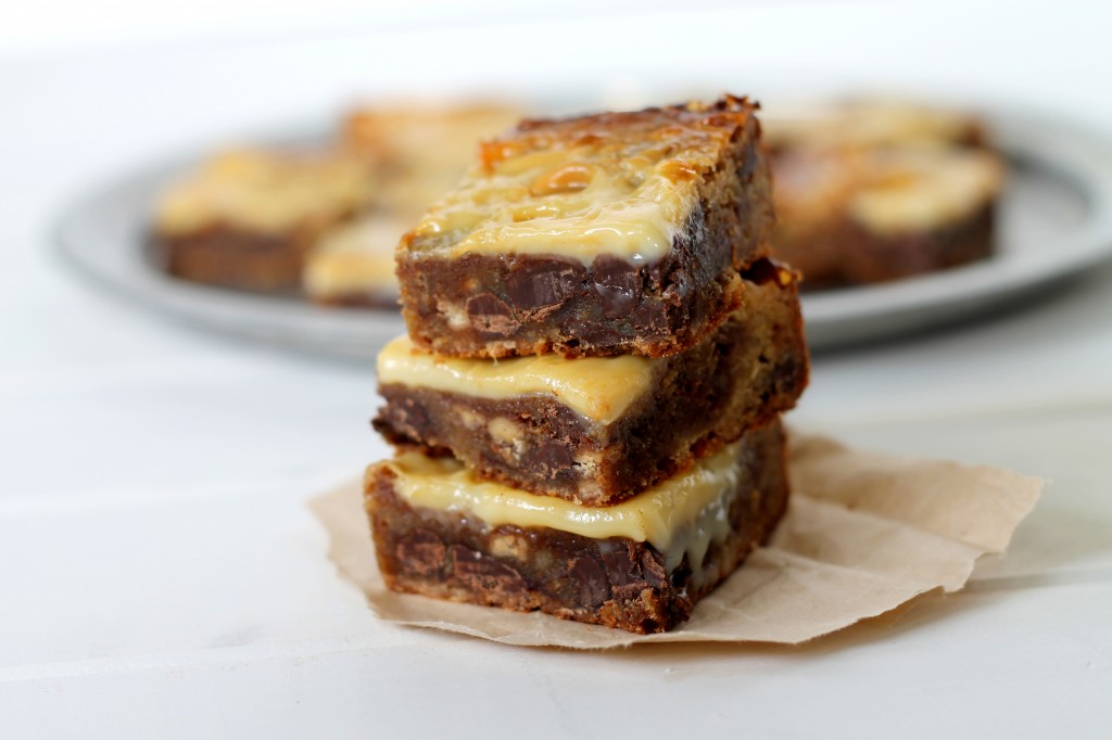 These chewy brown sugar Gooey Chocolate Toffee Blondies are full of toffee bits and chocolate chunks, topped with caramelized sweetened condensed milk.