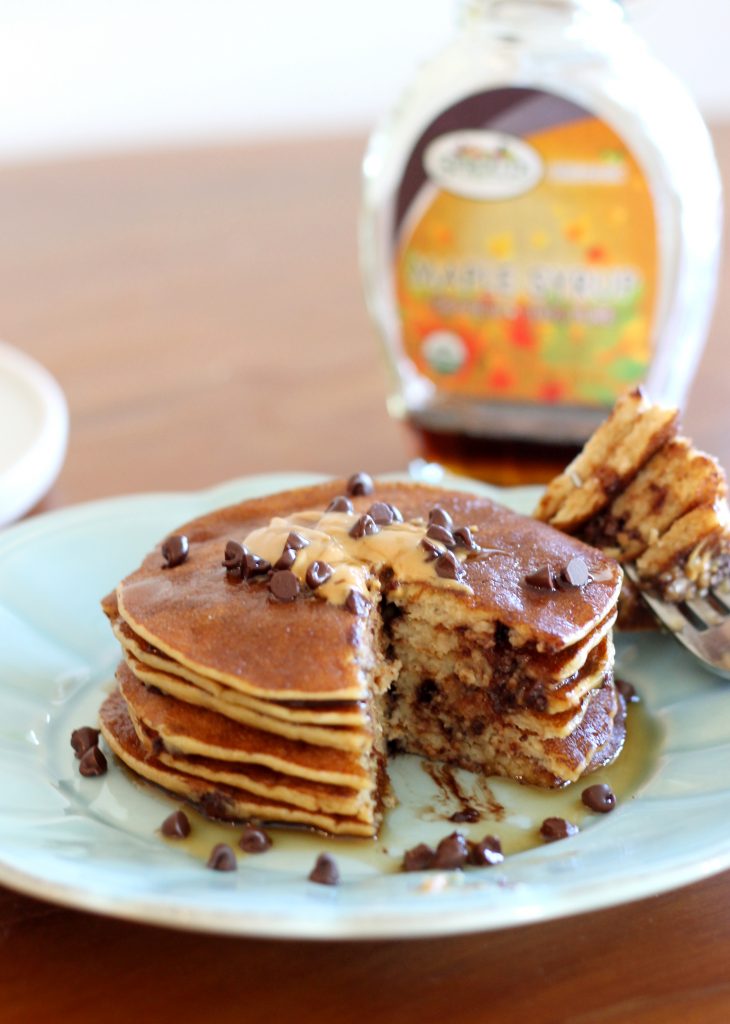 This easy recipe for Banana, Peanut Butter & Chocolate Chip Protein Pancakes is a healthy and delicious breakfast that is gluten-free and full of protein!
