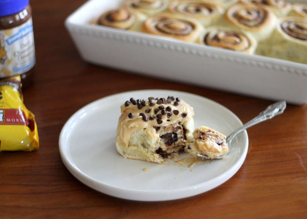 These Chocolate Peanut Butter Sweet Rolls with Peanut Butter Cream Cheese Frosting are full of peanut butter and chocolate flavor! You'll love this delicious twist on cinnamon rolls.
