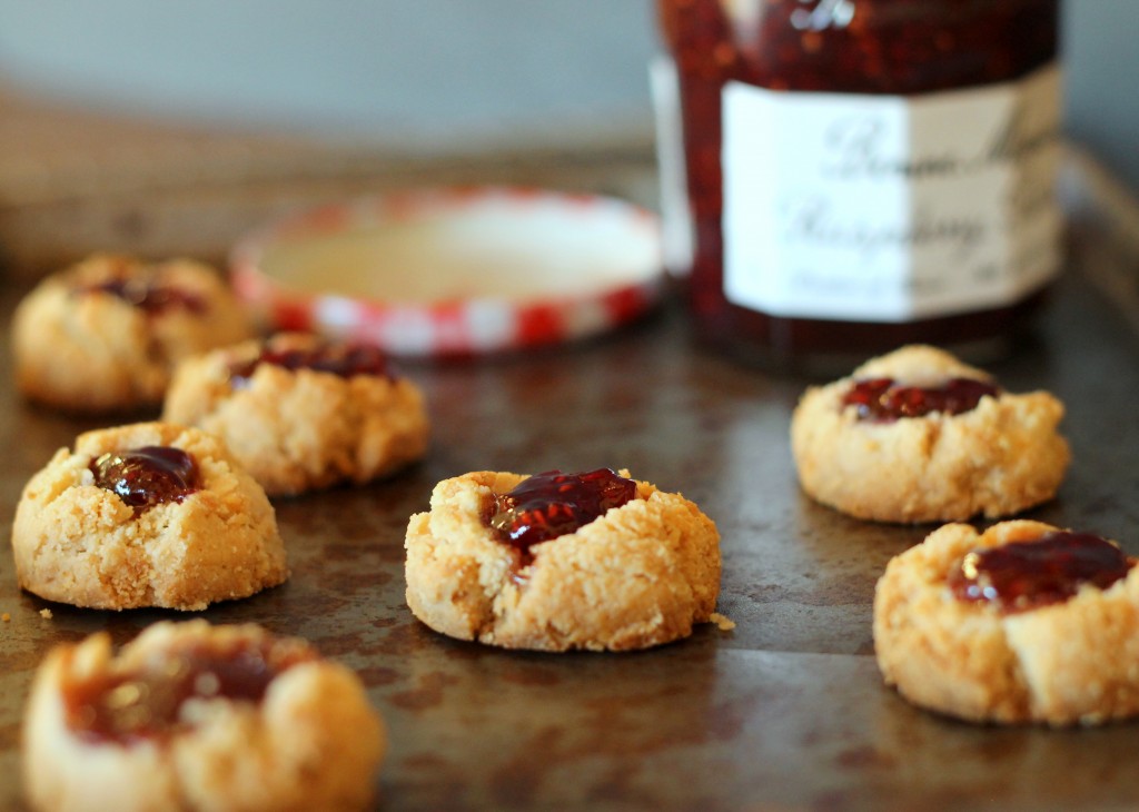 These Jam Thumbprint Cookies are gluten-free, vegan, refined sugar-free and can be made paleo. This simple recipe has only four ingredients!