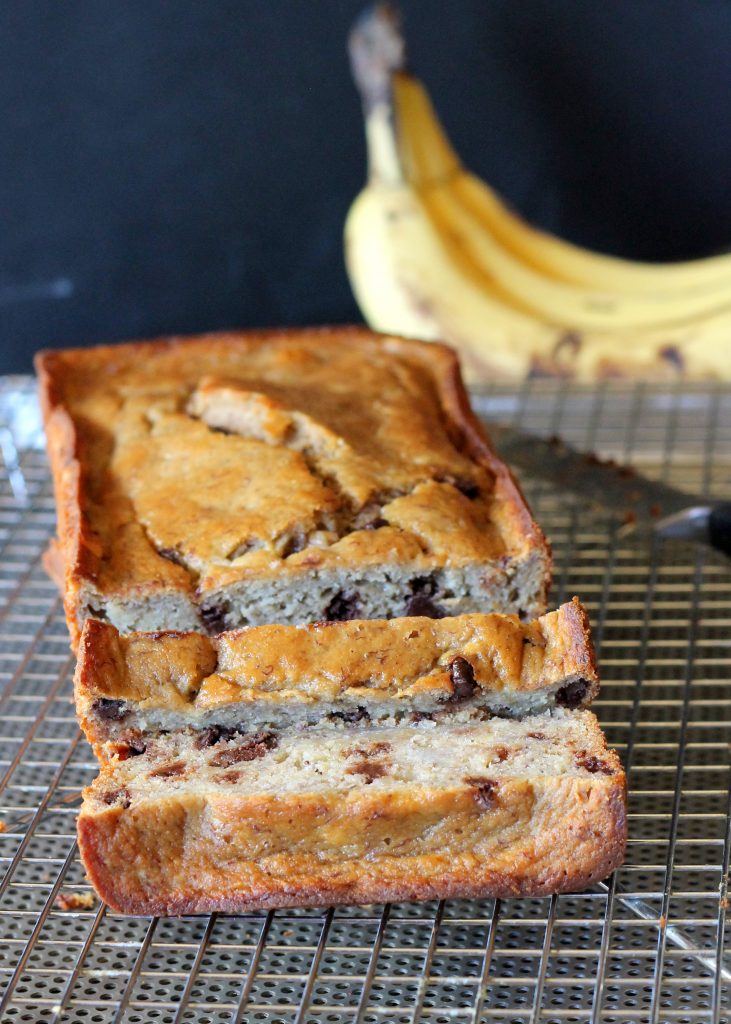 This Secretly Healthy Banana Bread tastes just like classic banana bread, but it's gluten free, oil free, & refined sugar free! It's made with oat flour for a texture very similar to the original. #glutenfree #bananabread #healthydessert #recipes #quickbread