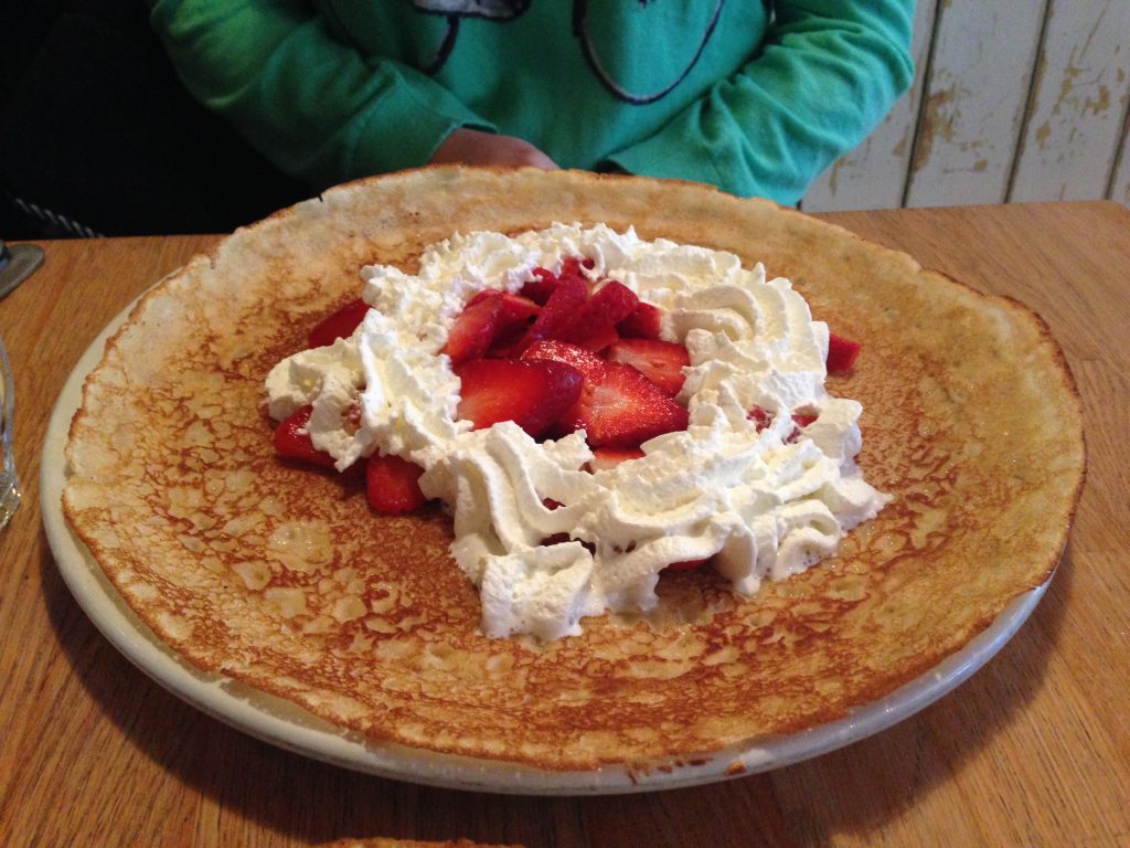 Strawberries & Whipped Cream Pancakes at Cafe de Klos in Amsterdam, Netherlands | Bakerita.com Abroad Bites