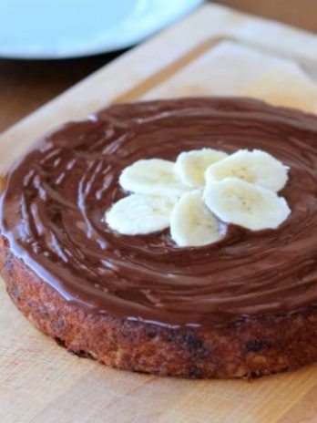 This single layer Paleo Banana Cake is topped with a silky chocolate ganache making it so simple and even more delicious! This dessert is gluten-free, refined sugar-free, and healthy enough to be breakfast! #bananacake #paleocake #paloe #glutenfree #paleodessert