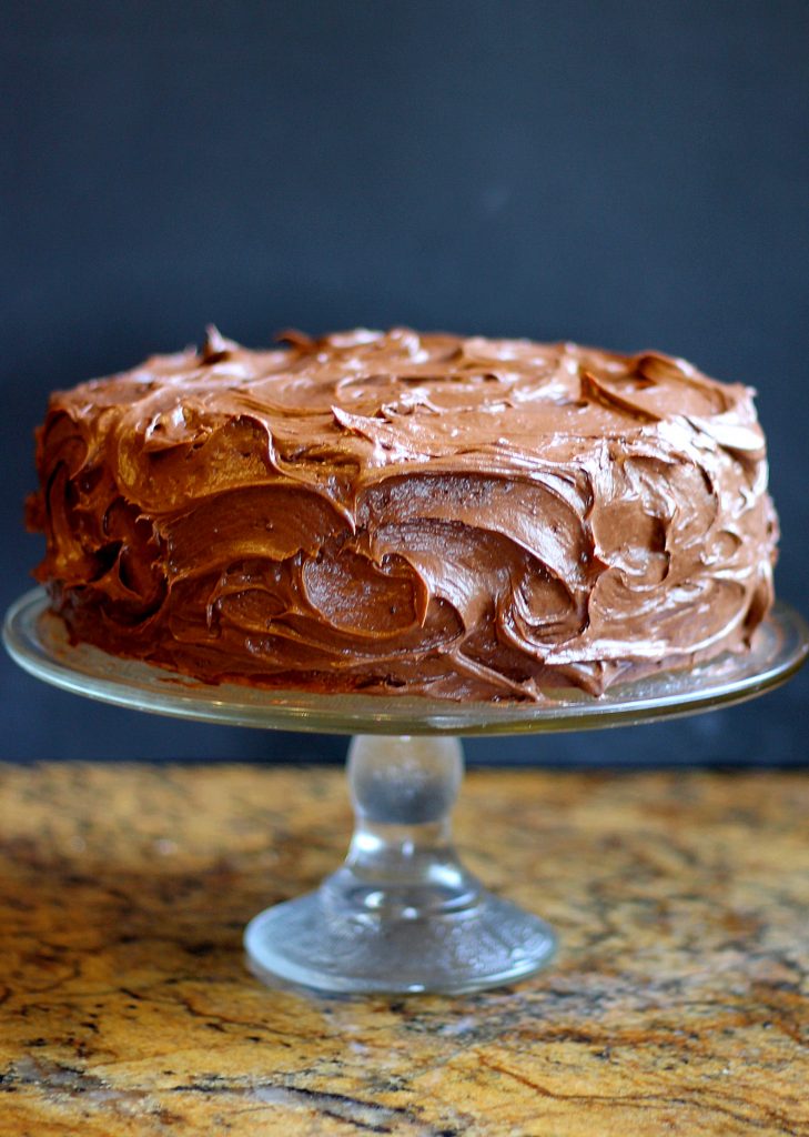 This recipe for Banana Layer Cake with Chocolate Cream Cheese Frosting makes one of the moistest banana cakes around - definitely not to be confused with banana bread. The chocolate cream cheese frosting makes it even more decadent!