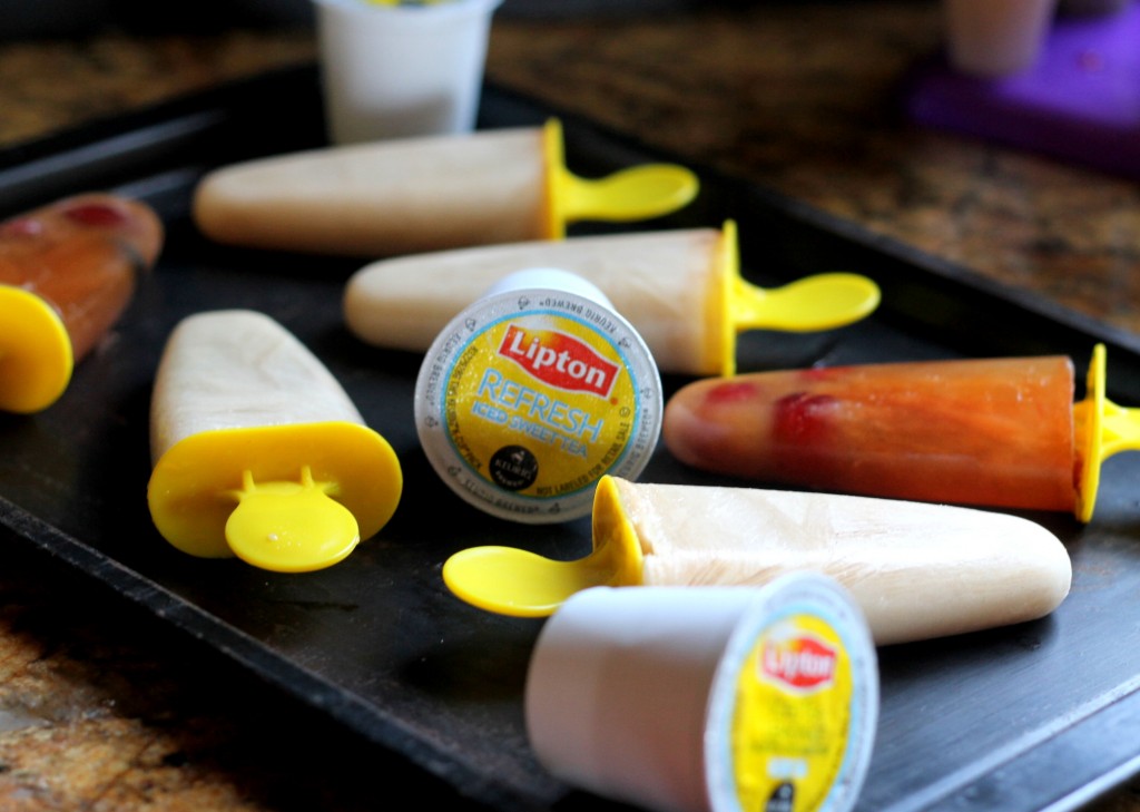 These Iced Tea Popsicles are made in minutes with Lipton Iced Tea K-Cups, and are easily customized to your favorite flavors!