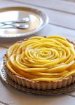 This Mango Tart uses fresh, ripe mangos and coconut cream to make a delicious dessert that's gluten-free, Paleo friendly, refined sugar-free, and vegan! The recipe includes step by step photos for how to make a beautiful mango flower.