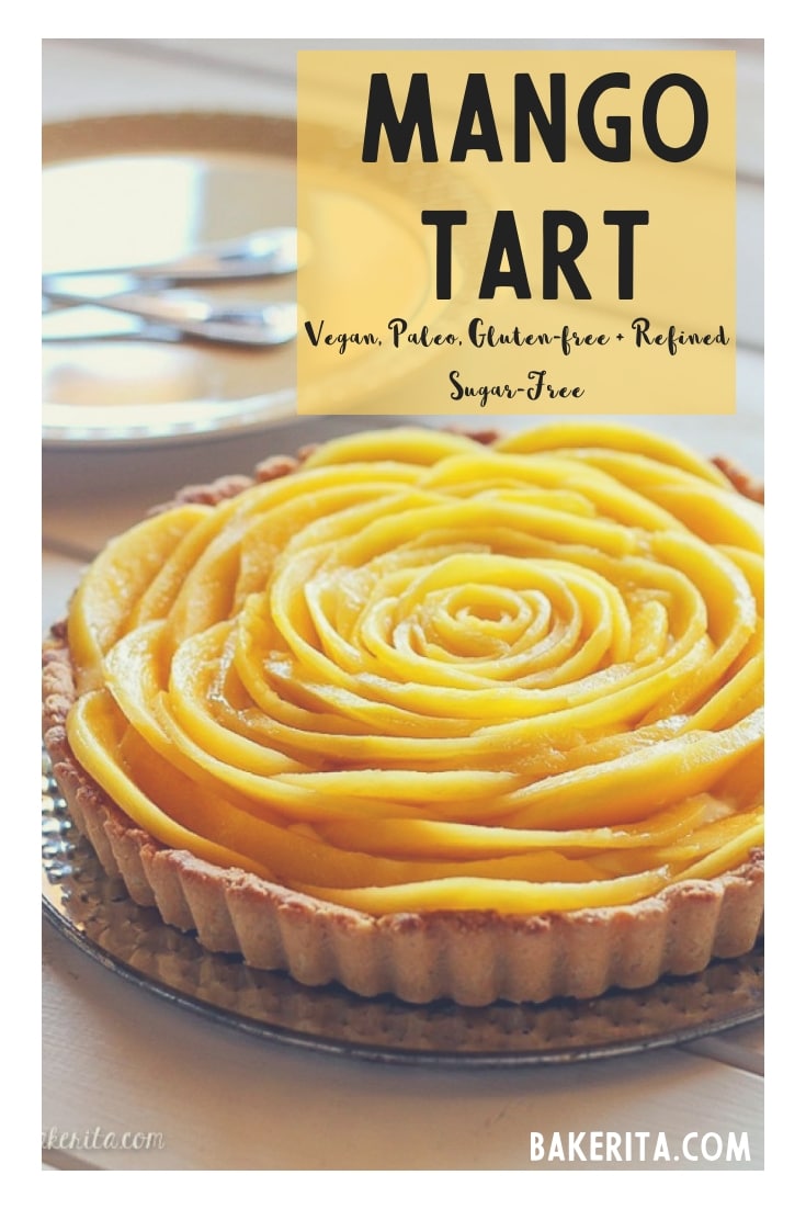 This Mango Tart uses fresh, ripe mangos and coconut cream to make a delicious dessert that's gluten-free, Paleo friendly, refined sugar-free, and vegan! The recipe includes step by step photos for how to make a beautiful mango flower. #paleo #vegan #mango #tart #bakerita #mangotart #vegandessert