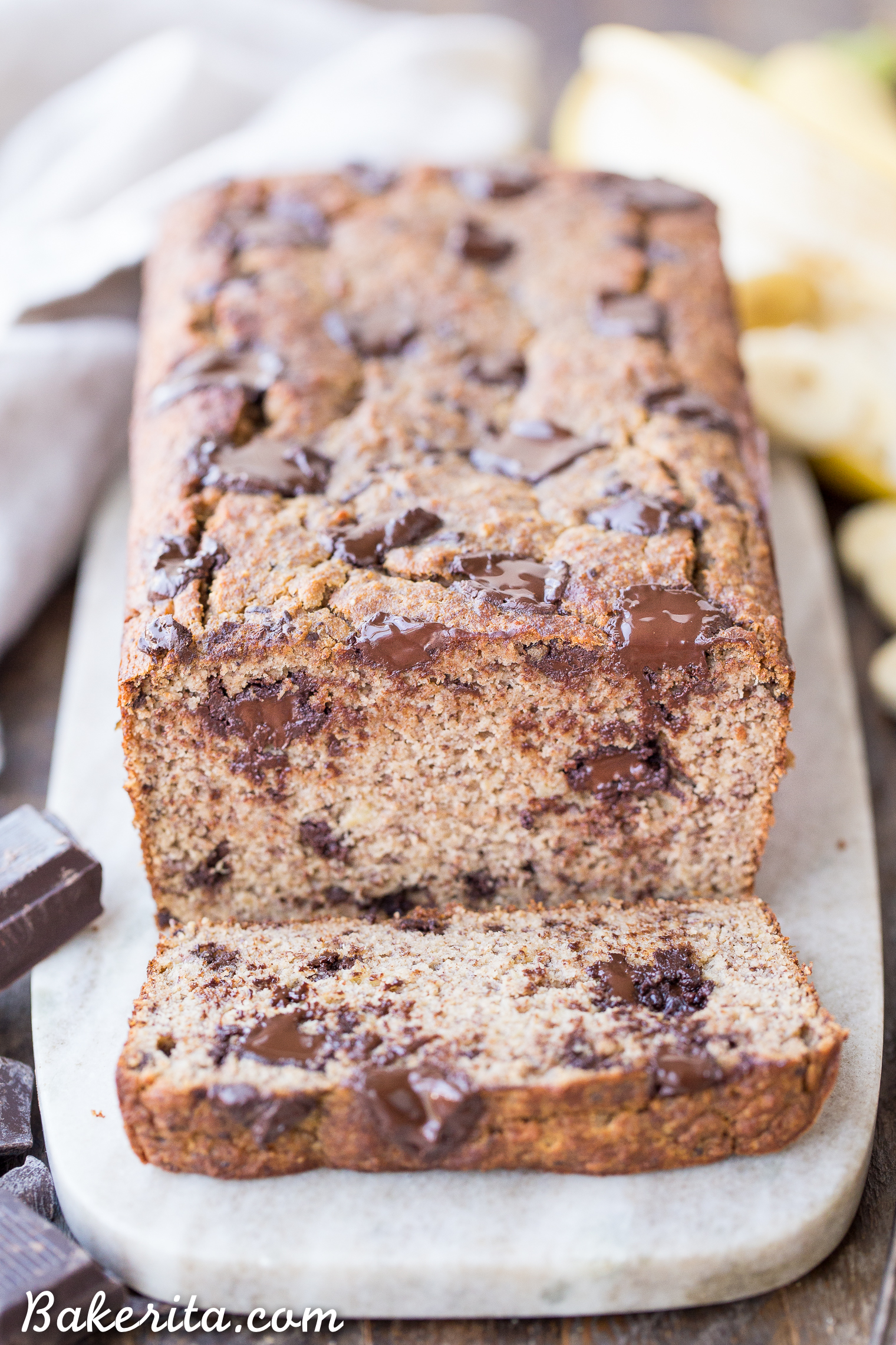This Paleo Chocolate Chunk Banana Bread is sweetened only with bananas for a guiltless treat that tastes just like traditional banana bread! This is easy recipe you'll come back to again and again. This paleo banana bread is also gluten-free, grain free, and sugar-free.