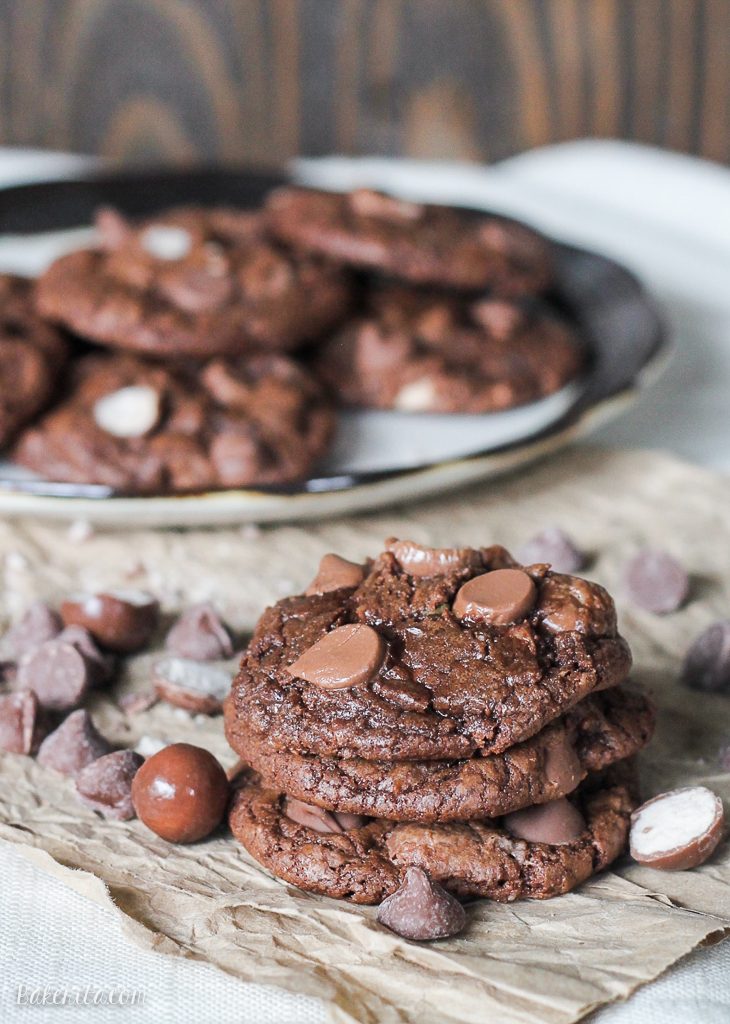 These Chocolate Malt Ball Cookies are dense chocolate fudge cookies packed with malted milk powder, chocolate chips, and malt balls. These quick and easy treats will fly off the cookie plate! 