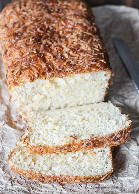 This Cheesy English Muffin Bread is an easy to make bread that comes together quickly and is full of cheddar cheese! It bakes into a beautiful loaf that's perfect for toasting.