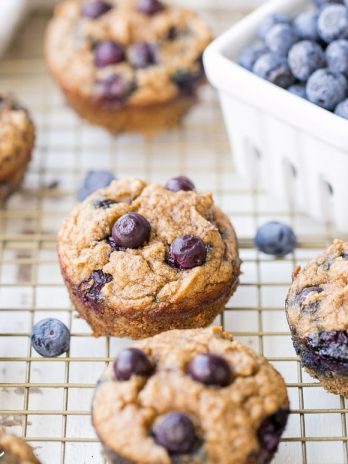 These Paleo Banana Blueberry Muffins are moist, sweet, and make the perfect quick snack or easy breakfast. They're gluten-free, grain-free and sweetened only with bananas - they also freeze super well, so they're great for meal prepping!