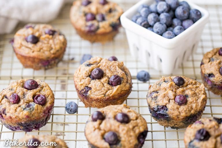 These Paleo Banana Blueberry Muffins are moist, sweet, and make the perfect quick snack or easy breakfast. They're gluten-free, grain-free and sweetened only with bananas - they also freeze super well, so they're great for meal prepping!