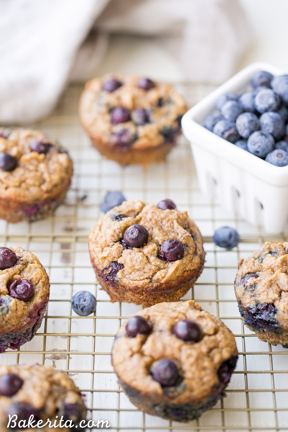 These Paleo Banana Blueberry Muffins are moist, sweet, and make the perfect quick snack or easy breakfast. They're gluten-free, grain-free and sweetened only with bananas - they also freeze super well, so they're great for meal prepping!