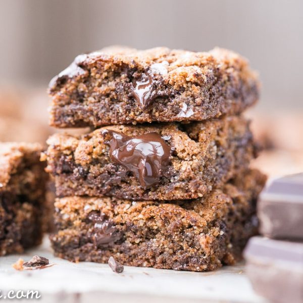 These Paleo Chocolate Chip Blondies have amazing crispy edges, a soft, chewy center and tons of dark, melted chocolate chunks! You'll go crazy for these paleo, gluten-free and refined sugar free blondies.