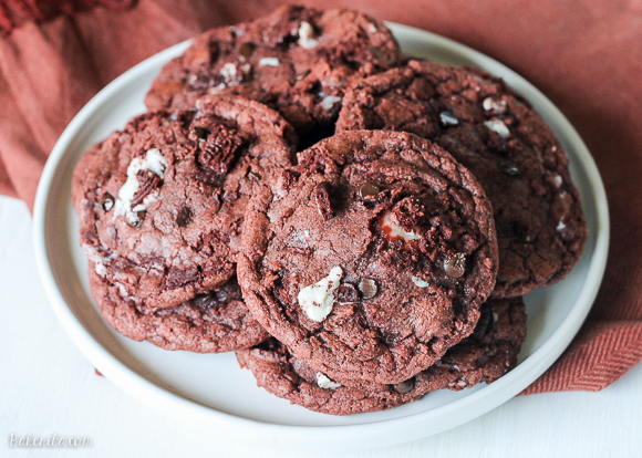 These Red Velvet Oreo Cookies with Cream Cheese are from-scratch red velvet cookies with Red Velvet Oreos and mini chocolate chips folded in. The center has a luscious sweet cream cheese filling. These are some decadent cookies!