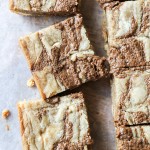These Browned Butter White Chocolate Blondies with CookieNut Butter Swirl are quick, easy, and delicious! They come together in one bowl, and you'll love the unique CookieNut Butter swirl.