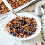 This Banana Coconut Granola tastes warm and tropical, and is full of crunch from the coconut flakes and pecans! It makes the perfect snack by itself, or mix it into some yogurt for the perfect breakfast.