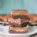 These Peanut Butter Crunch Brownies are a fudge brownie topped with peanuts, peanut butter cups, and a chocolate peanut butter Rice Krispie ganache. These are for the chocolate peanut butter lovers!