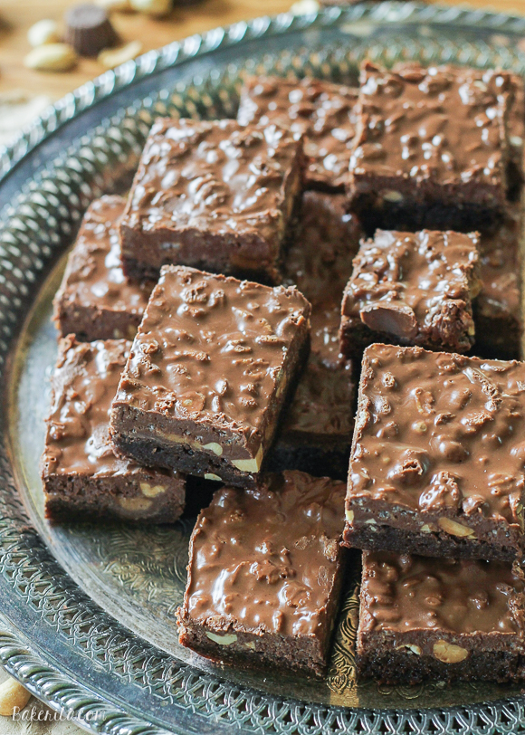 These Peanut Butter Crunch Brownies are a fudge brownie topped with peanuts, peanut butter cups, and a chocolate peanut butter Rice Krispie ganache. These are for the chocolate peanut butter lovers!