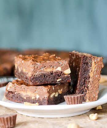 These Peanut Butter Crunch Brownies are a fudge brownie topped with peanuts, peanut butter cups, and a chocolate peanut butter Rice Krispie ganache. These are for the chocolate peanut butter lovers!