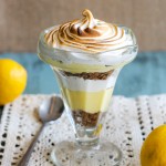 These Lemon Meringue Pie Parfaits are a no-bake dessert that will be your new summer favorite! Lemon curd, graham cracker crumbs, and meringue makes the best individual treats.