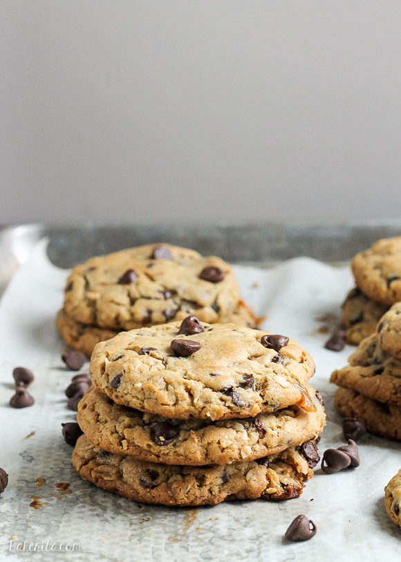 These big Peanut Butter Chocolate Chip Caramel Filled Cookies are soft and chewy peanut butter oatmeal cookies studded with chocolate chips, surrounding a chocolate covered caramel!