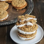 These Peanut Butter Oatmeal Sandwich Cookies with Marshmallow Creme Filling are reminiscent of Little Debbie's Oatmeal Creme Pies with their super soft texture and creme filling - but they have a peanut butter twist!