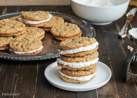 These Peanut Butter Oatmeal Sandwich Cookies with Marshmallow Creme Filling are reminiscent of Little Debbie's Oatmeal Creme Pies with their super soft texture and creme filling - but they have a peanut butter twist!
