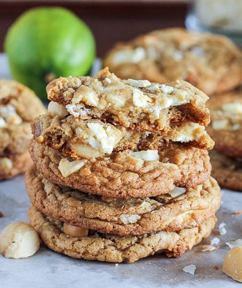 These Tropical Cookies are loaded with white chocolate, macadamia nuts, lime zest, and toasted coconut! These tropical treats will have you dreaming of a vacation.