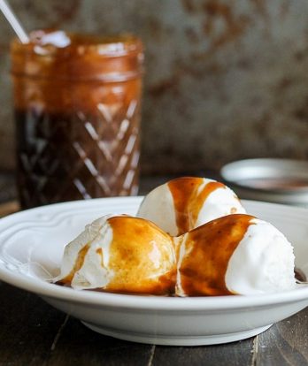 This Paleo Caramel Sauce is made with coconut milk and coconut sugar for a delicious, silky smooth sauce that's refined sugar free and vegan! It's perfect as a Paleo substitute for caramel sauce in any recipe.