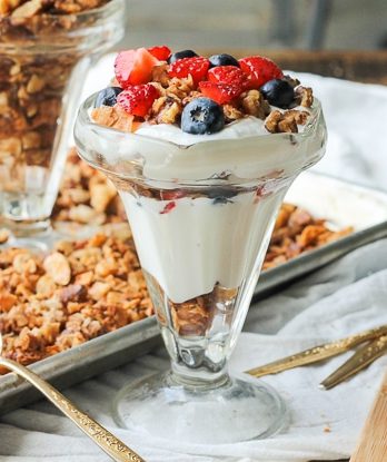 This Paleo Granola uses nuts and coconut to bulk it up and add a ton of protein, while egg whites help keep the granola clumpy and crunchy! It is gluten-free, refined sugar-free, and dairy-free.