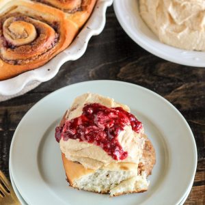 These Peanut Butter & Jelly Cinnamon Rolls are a delicious twist on a classic breakfast treat. These cinnamon rolls are filled with peanut butter and jelly and topped with a peanut butter cream cheese frosting.