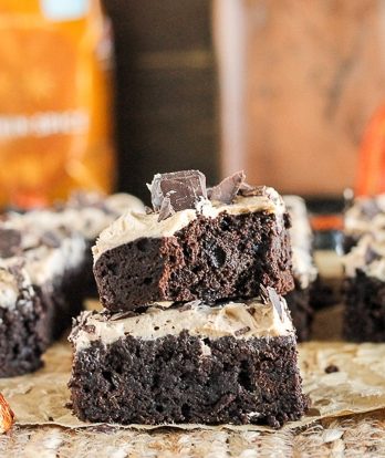These Pumpkin Spice Latte Brownies are homemade pumpkin brownies infused with coffee and topped with a whipped pumpkin spice latte frosting.