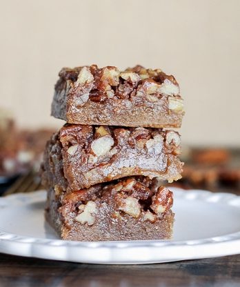 These Pecan Pie Blondies are a portable version of one of my favorite pies! The recipe for these sweet bars makes rich browned butter blondies topped with crunchy pecan pie filling.