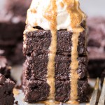 These are the Ultimate Gluten Free Fudge Brownies! This easy recipe makes incredibly fudgy, melt in your mouth chocolate brownies with an optional paleo chocolate frosting on top. This recipe is refined sugar free and Paleo-friendly.